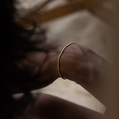 Brazalete de cadena en caja.